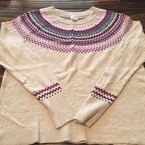 Cream sweater with purple accents